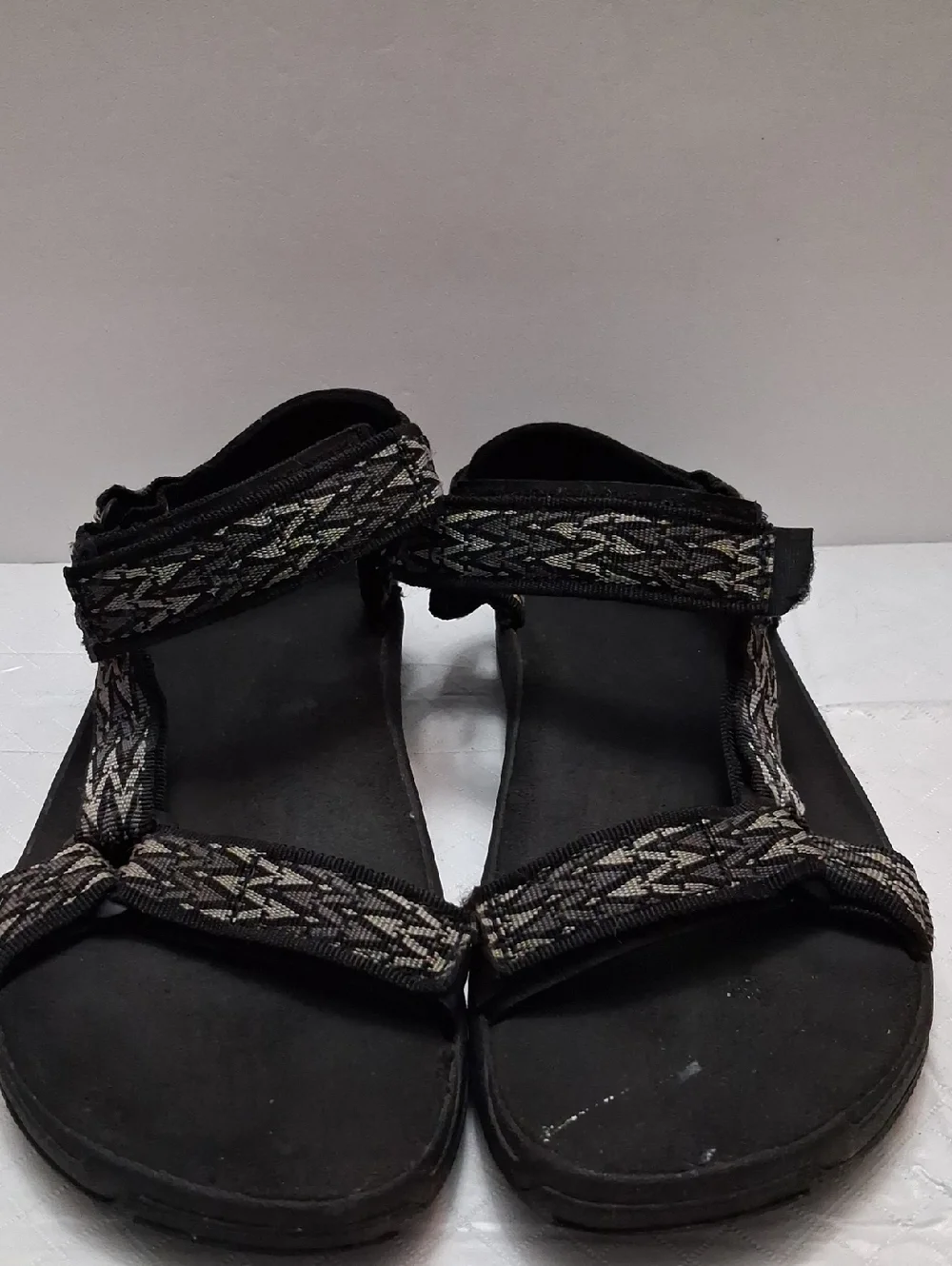 Teva Size 10 men's sandal in black, gray strap with velcro adjustable strap.